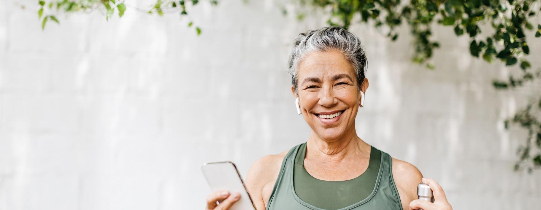 a woman holding a phone