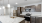 Modern kitchen with brown cabinets and granite countertops