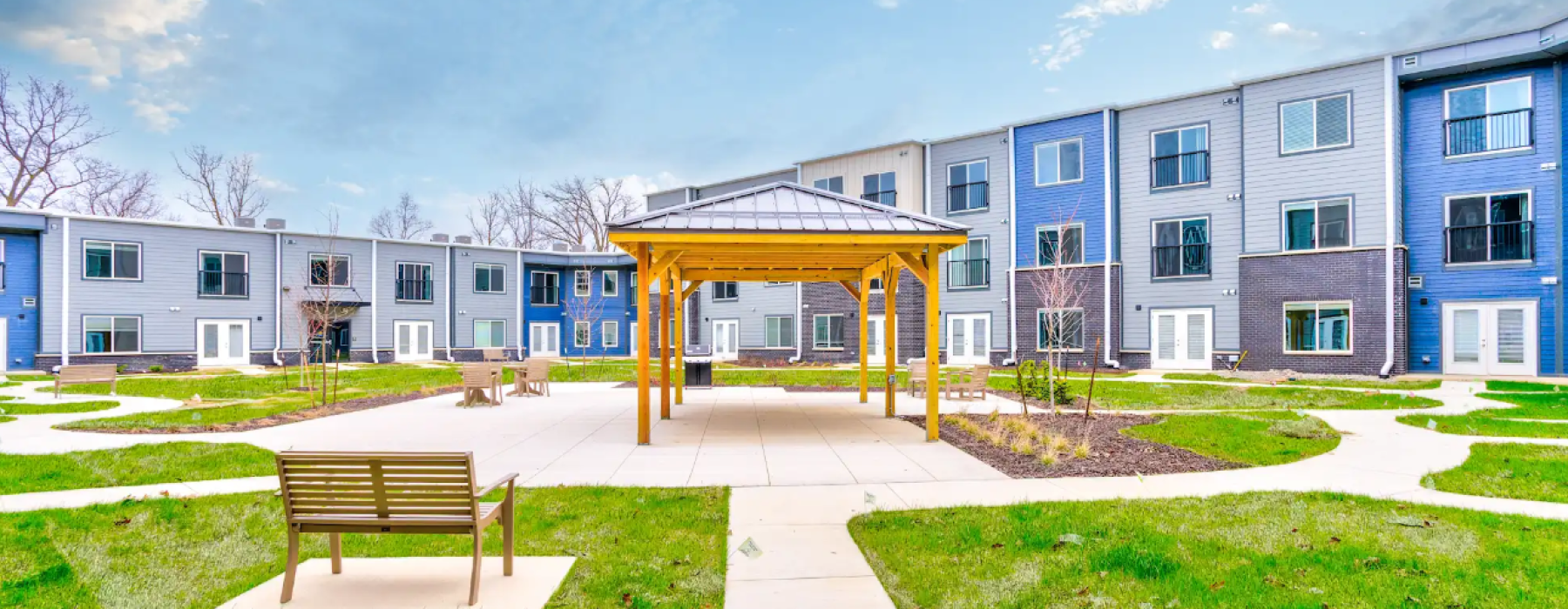 Apartment building exterior with pergola
