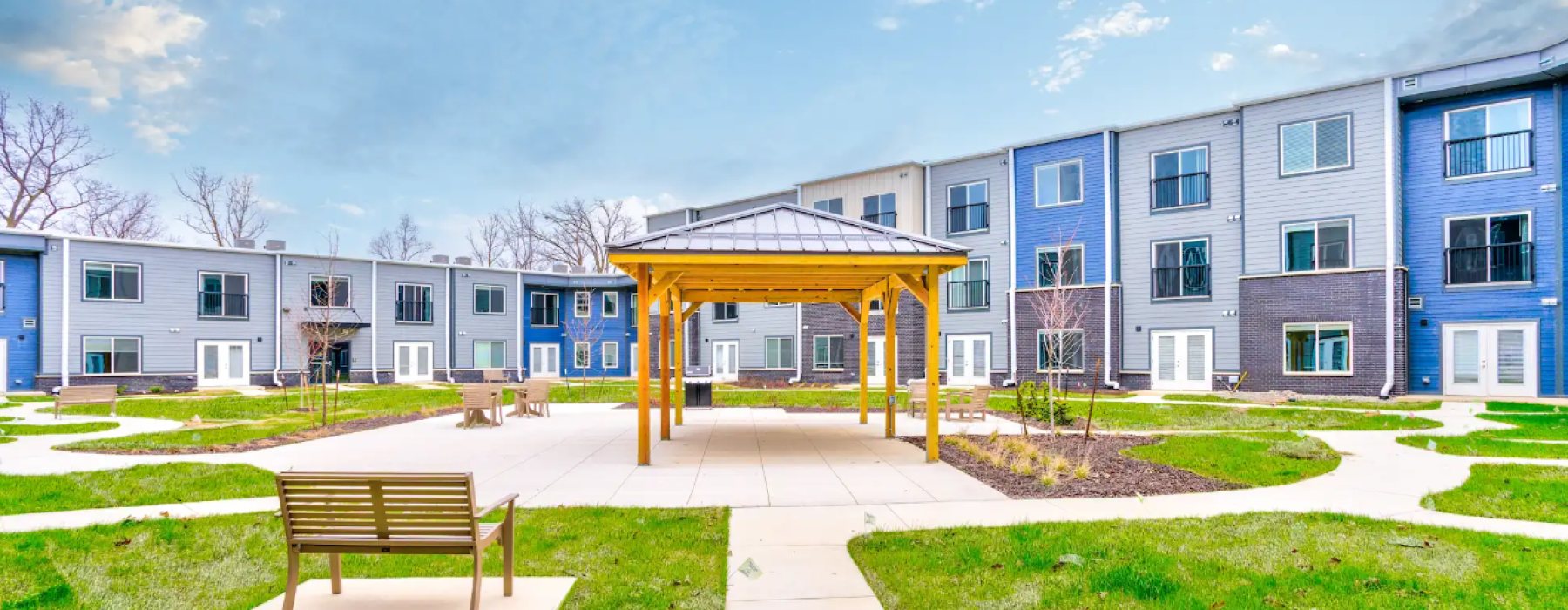 Apartment building exterior with pergola